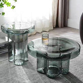Cloud-shaped modern glass coffee table set with two pieces in vibrant orange, green, purple, and black